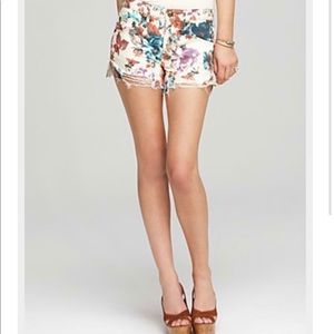 Free People Distressed Floral Denim Cut Off Shorts